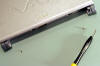 Two concealed screws